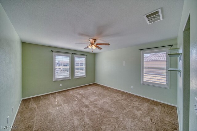 5460 Chippewa, Pahrump, NV 89061 - carpeted empty room with a ceiling fan, baseboards, and a textured ceiling