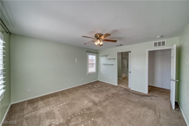 5460 Chippewa, Pahrump, NV 89061 - unfurnished bedroom with carpet floors, baseboards, and a ceiling fan