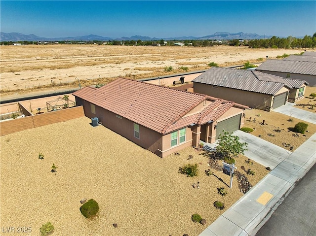 5460 Chippewa, Pahrump, NV 89061 - aerial view of property and surrounding area with a mountainous background and a desert landscape