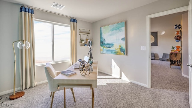 carpeted office with baseboards