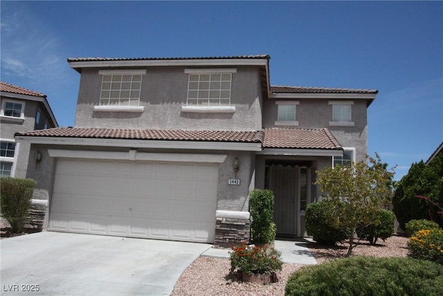 3440 Crystal Tower St, Las Vegas, NV 89129 - mediterranean / spanish home featuring stucco siding, a tiled roof, concrete driveway, and an attached garage