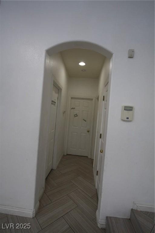 3440 Crystal Tower St, Las Vegas, NV 89129 - corridor featuring arched walkways and baseboards