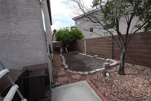 3440 Crystal Tower St, Las Vegas, NV 89129 - fenced backyard featuring cooling unit and a patio area