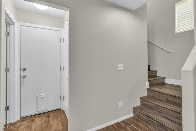 7632 Calico Fields St, Las Vegas, NV 89149 - entrance foyer with wood finished floors, stairs, and baseboards
