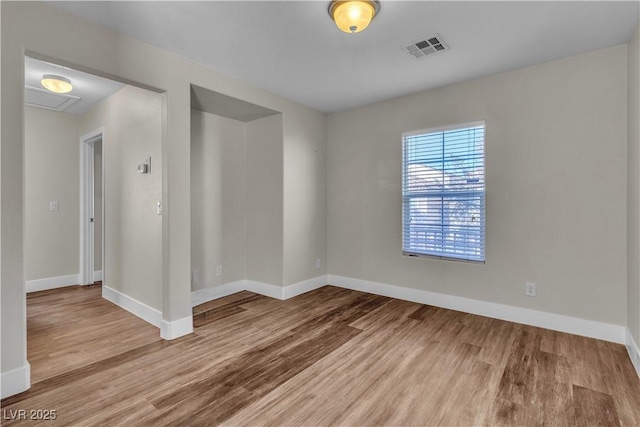 7632 Calico Fields St, Las Vegas, NV 89149 - empty room featuring wood finished floors and baseboards