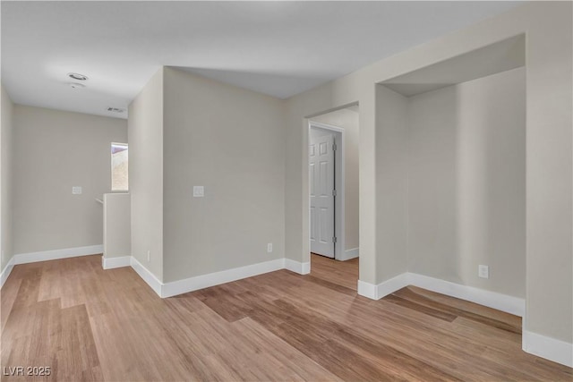 7632 Calico Fields St, Las Vegas, NV 89149 - empty room with baseboards and light wood-type flooring