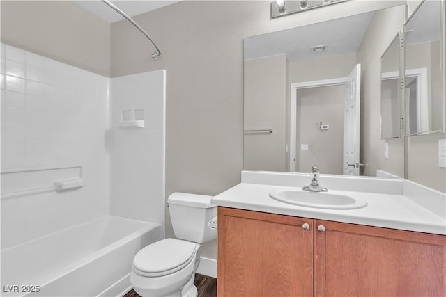 7632 Calico Fields St, Las Vegas, NV 89149 - full bathroom featuring toilet, vanity, washtub / shower combination, and wood finished floors