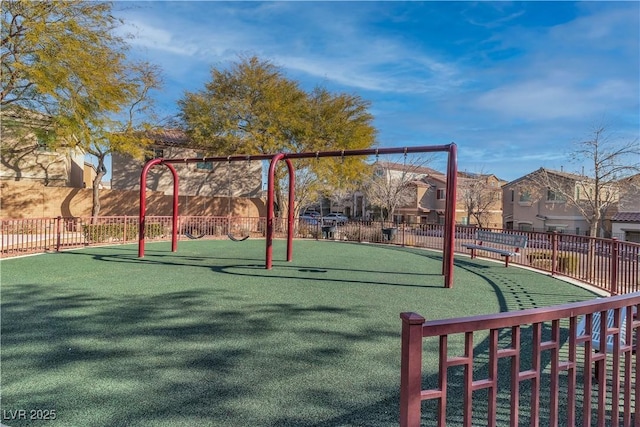 7632 Calico Fields St, Las Vegas, NV 89149 - communal playground with fence and a residential view