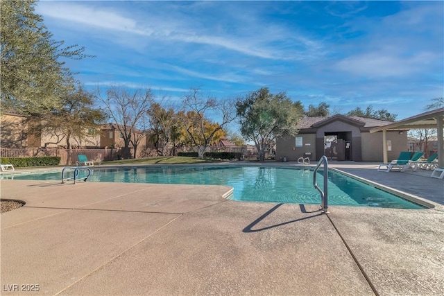 7632 Calico Fields St, Las Vegas, NV 89149 - community pool featuring fence and a patio area