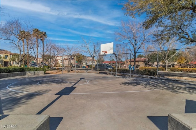 7632 Calico Fields St, Las Vegas, NV 89149 - view of basketball court featuring community basketball court, fence, and a residential view