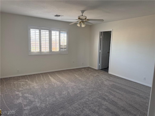 311 Glenoaks St, Pahrump, NV 89048 - empty room featuring ceiling fan, carpet, and baseboards
