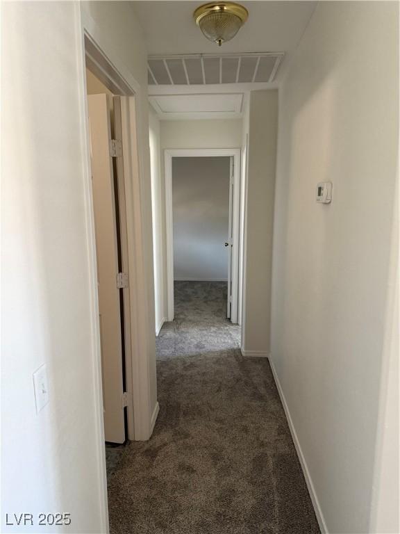 311 Glenoaks St, Pahrump, NV 89048 - hallway with carpet flooring and baseboards