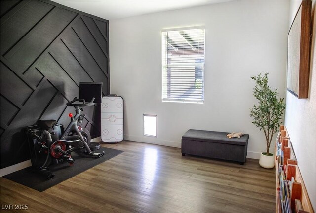 5733 Coral Sun St, North Las Vegas, NV 89031 - exercise room featuring wood finished floors, healthy amount of natural light, and baseboards