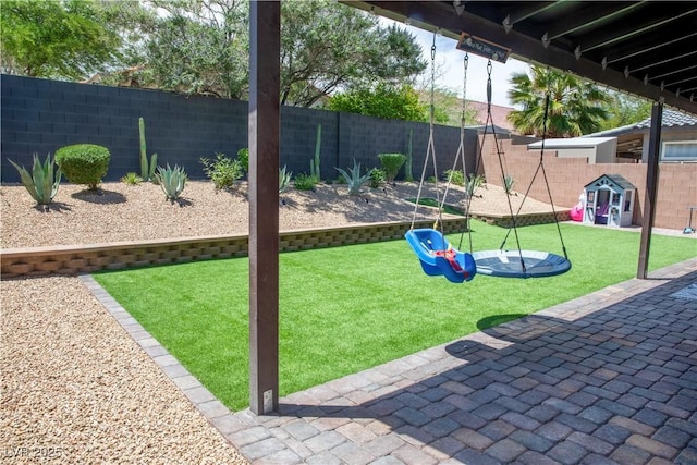 5733 Coral Sun St, North Las Vegas, NV 89031 - view of yard featuring a patio area