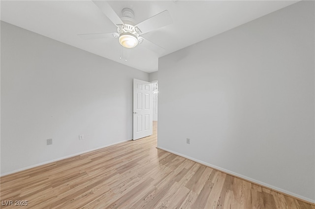9917 Arbuckle Dr, Las Vegas, NV 89134 - unfurnished room featuring light wood-style flooring, baseboards, and a ceiling fan