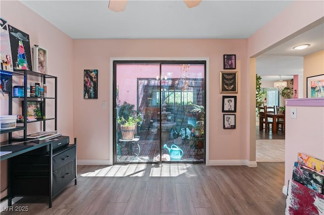 2479 Domingo St, Las Vegas, NV 89121 - doorway with a chandelier, wood finished floors, and baseboards