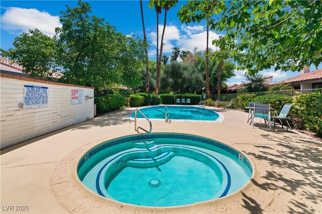 2479 Domingo St, Las Vegas, NV 89121 - community pool featuring a hot tub and a patio