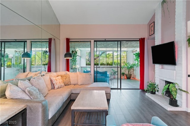 2479 Domingo St, Las Vegas, NV 89121 - living area featuring wood finished floors and a fireplace