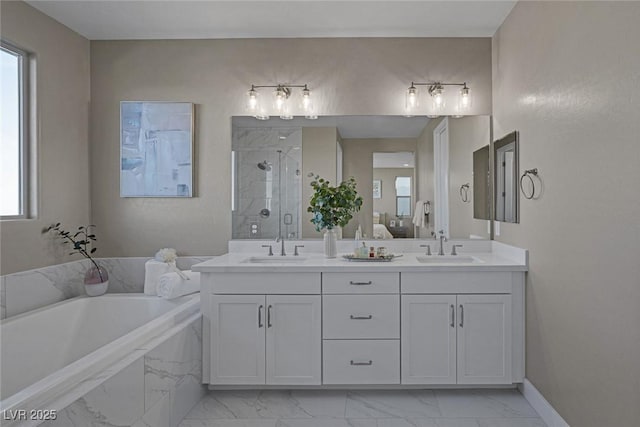 2246 Bird Of Prey St, Las Vegas, NV 89138 - full bath with marble look tiles, a shower stall, a garden tub, and double vanity