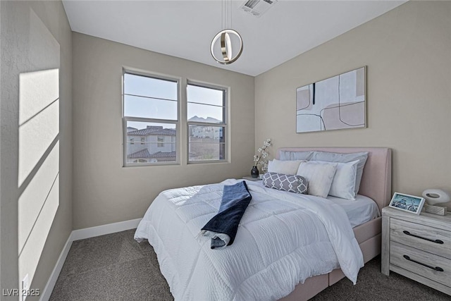 2246 Bird Of Prey St, Las Vegas, NV 89138 - bedroom featuring dark carpet and baseboards
