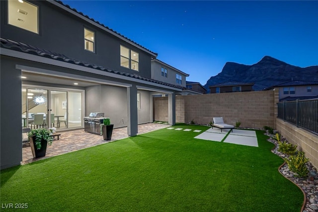 2246 Bird Of Prey St, Las Vegas, NV 89138 - view of yard with a patio