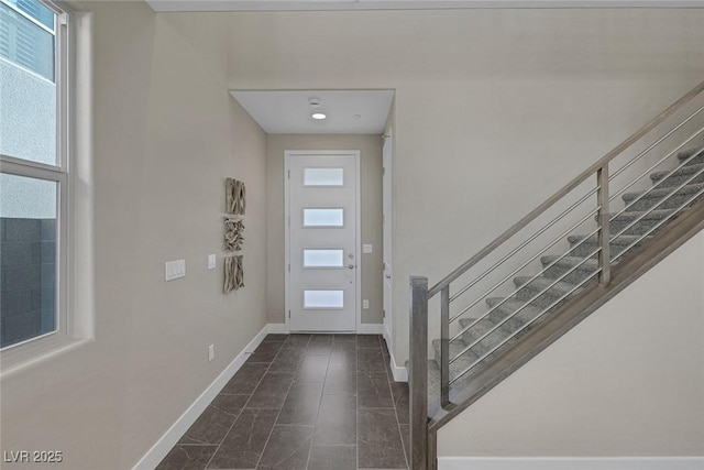 2246 Bird Of Prey St, Las Vegas, NV 89138 - foyer featuring baseboards and stairs