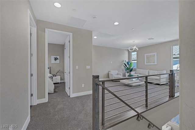 2246 Bird Of Prey St, Las Vegas, NV 89138 - hallway with an upstairs landing, carpet, baseboards, and recessed lighting