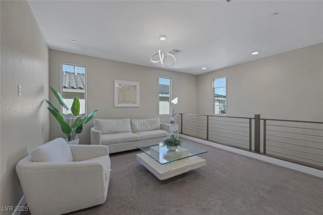 2246 Bird Of Prey St, Las Vegas, NV 89138 - living room featuring carpet flooring, recessed lighting, and a chandelier