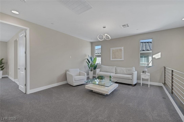 2246 Bird Of Prey St, Las Vegas, NV 89138 - carpeted living area featuring baseboards, recessed lighting, and a chandelier