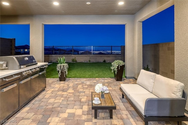 2246 Bird Of Prey St, Las Vegas, NV 89138 - view of patio featuring outdoor lounge area and area for grilling