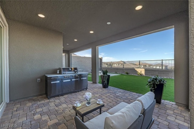 2246 Bird Of Prey St, Las Vegas, NV 89138 - view of patio with area for grilling and an outdoor living space