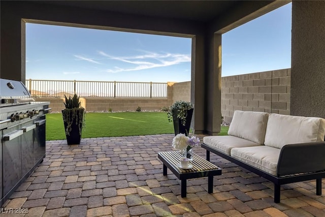 2246 Bird Of Prey St, Las Vegas, NV 89138 - view of patio featuring an outdoor living space and area for grilling