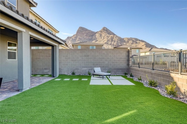 2246 Bird Of Prey St, Las Vegas, NV 89138 - view of yard featuring a mountain view and a patio area