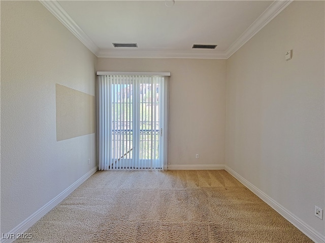 unfurnished room with crown molding, baseboards, and carpet