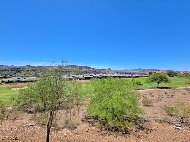 mountain view featuring a golf course