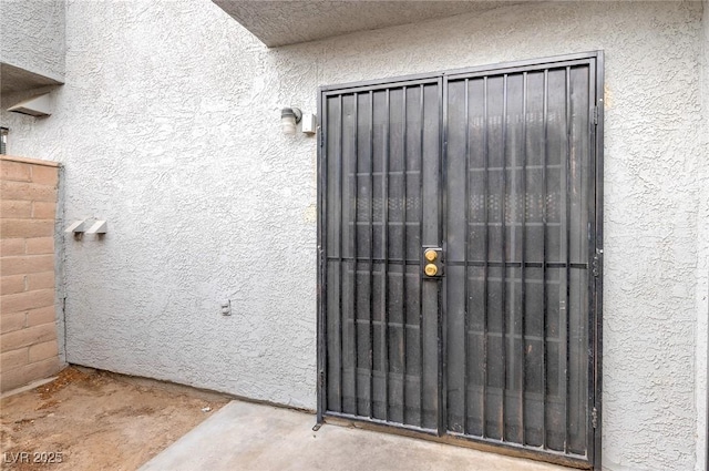 875 Rhinegold Way, Las Vegas, NV 89110 - entrance to property featuring stucco siding