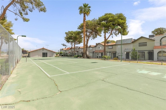 875 Rhinegold Way, Las Vegas, NV 89110 - view of tennis court featuring a residential view