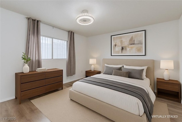 875 Rhinegold Way, Las Vegas, NV 89110 - bedroom with wood finished floors and baseboards