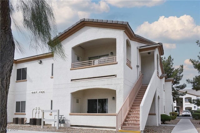 5650 E Sahara Ave Unit 2062, Las Vegas, NV 89142 - view of property featuring central air condition unit and stairway