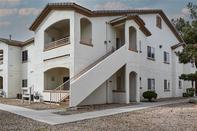 5650 E Sahara Ave Unit 2062, Las Vegas, NV 89142 - view of building exterior with stairway and central air condition unit