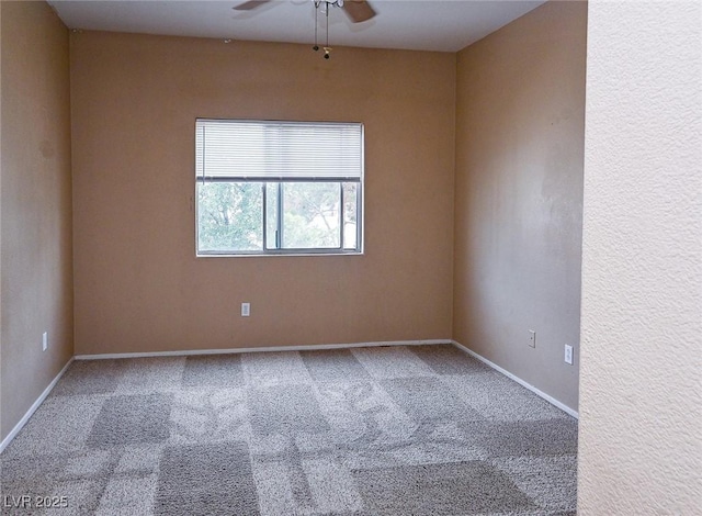 5650 E Sahara Ave Unit 2062, Las Vegas, NV 89142 - carpeted spare room featuring ceiling fan and baseboards
