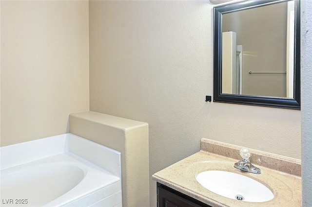 5650 E Sahara Ave Unit 2062, Las Vegas, NV 89142 - bathroom featuring vanity and a garden tub
