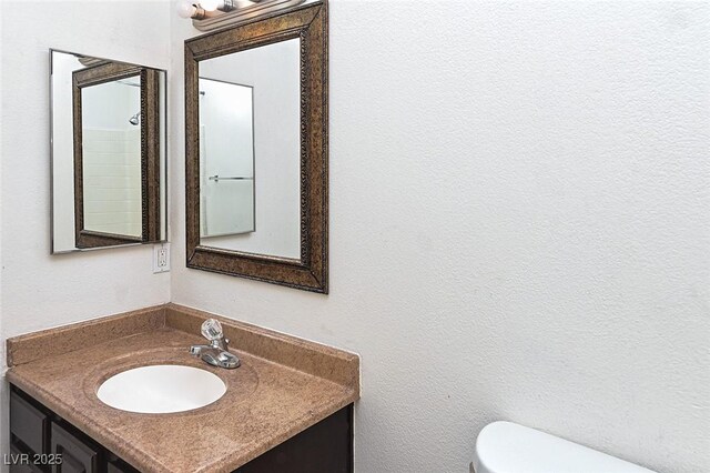 5650 E Sahara Ave Unit 2062, Las Vegas, NV 89142 - bathroom featuring toilet and vanity