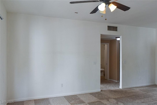 5650 E Sahara Ave Unit 2062, Las Vegas, NV 89142 - spare room with carpet floors, a ceiling fan, and baseboards