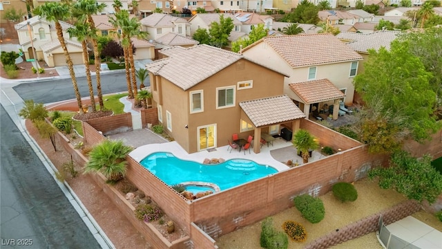 1200 Dream Bridge Dr, Las Vegas, NV 89144 - view of pool with a pool with connected hot tub, a fenced backyard, a residential view, and a gazebo