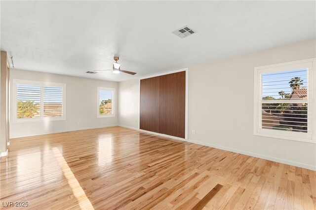 1200 Dream Bridge Dr, Las Vegas, NV 89144 - unfurnished bedroom featuring light wood-type flooring, a closet, and ceiling fan
