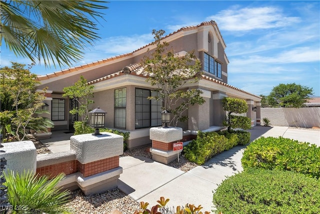 8437 Apple Hill Ct, Las Vegas, NV 89128 - view of front facade featuring stucco siding and a tile roof