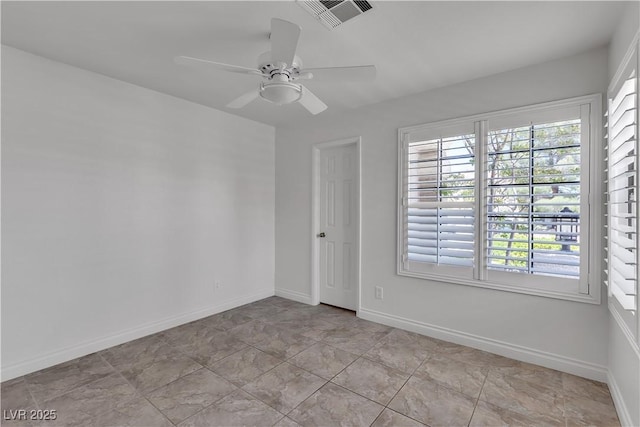 8437 Apple Hill Ct, Las Vegas, NV 89128 - spare room with a ceiling fan and baseboards