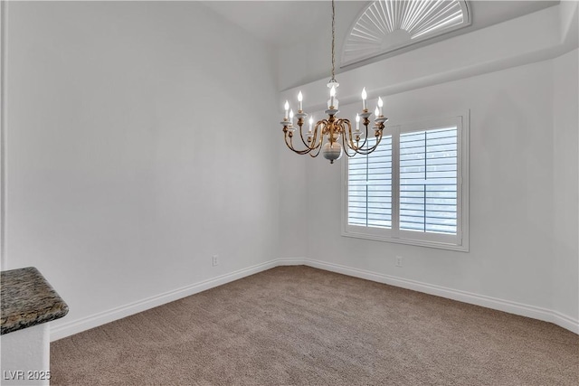 8437 Apple Hill Ct, Las Vegas, NV 89128 - carpeted spare room featuring a chandelier and baseboards