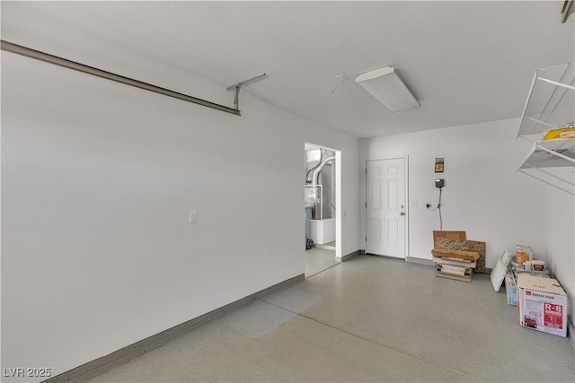 8437 Apple Hill Ct, Las Vegas, NV 89128 - garage featuring baseboards